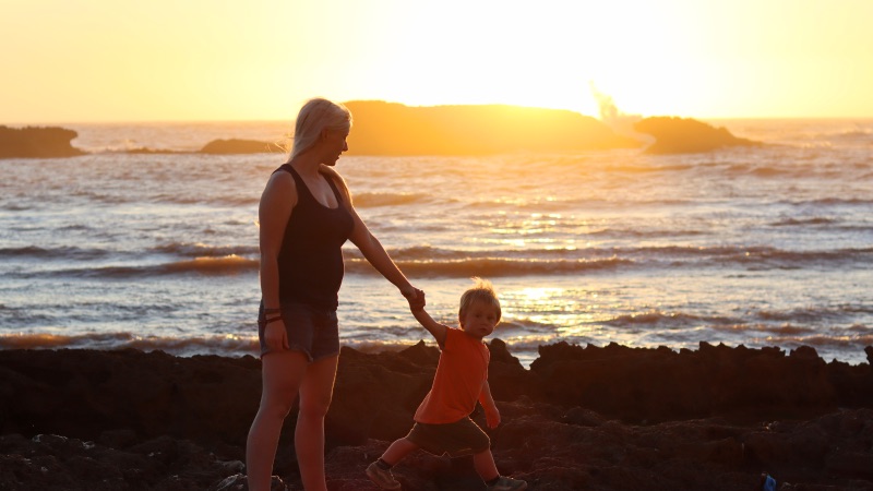 Sunset beach Mama and toddler